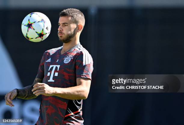 Bayern Munich's French defender Lucas Hernandez heads the ball as he takes part in a training session in Munich, southern Germany, on September 12 on...