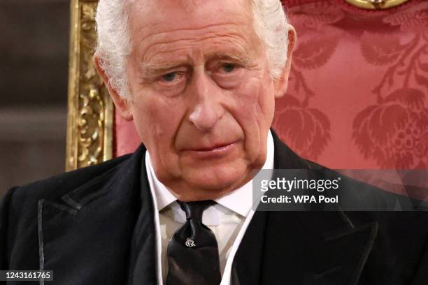 Britain's King Charles III looks on during the presentation of Addresses by both Houses of Parliament in Westminster Hall, inside the Palace of...