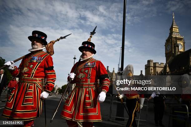 Yeomen of the Guard leave after attending the presentation of Addresses by both Houses of Parliament in Westminster Hall, inside the Palace of...