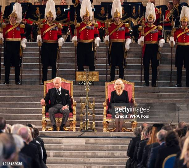 King Charles III and Camilla, Queen Consort take part in an address in Westminster Hall as Speaker of the House of Commons Lindsay Hoyle speaks on...