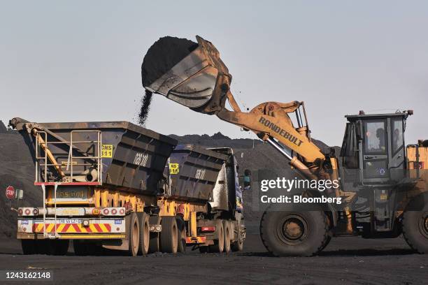 Truck is loaded with coal at the Mafube open-cast coal mine, operated by Exxaro Resources Ltd. And Thungela Resources Ltd., in Mpumalanga, South...