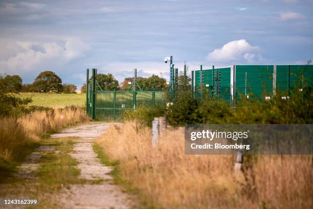 Security fencing surrounds the Cuadrilla Resources Ltd. Exploration gas well site on Preston New Road near Blackpool, UK, on Saturday, Sept. 10,...