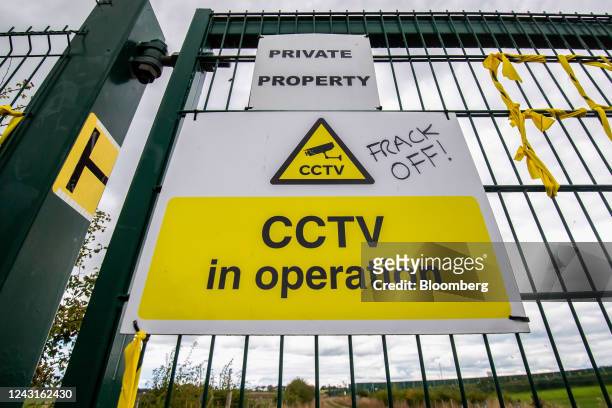 Graffiti reading "Frack Off" on a security sign at the Cuadrilla Resources Ltd. Exploration gas well site on Preston New Road near Blackpool, UK, on...