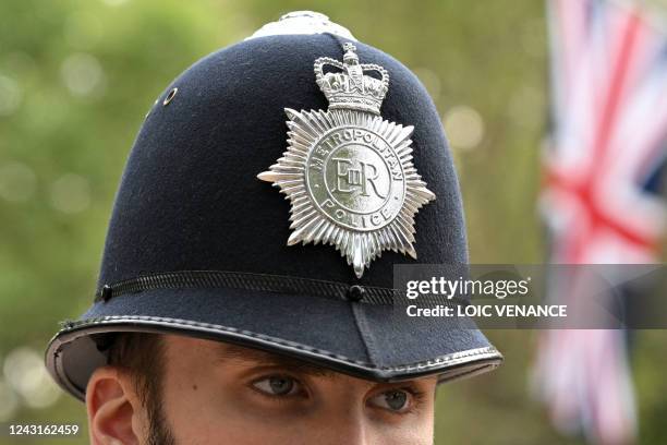 The Queen's cypher, EIIR is seen on a police helmet in London on September 12 one of several changes needed, will be to change the cypher to CIIIR...