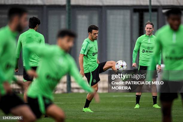 Sporting Lisbon's Portuguese midfielder Pedro Goncalves attends a training session at the Cristiano Ronaldo Academy training ground in Alcochete,...