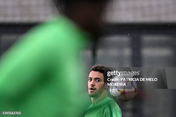 Sporting Lisbon's Portuguese midfielder Pedro Goncalves looks at the ball during a training session at the Cristiano Ronaldo Academy training ground...