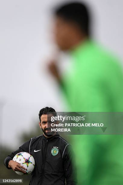 Sporting Lisbon's Portuguese coach Ruben Amorim attends a training session at the Cristiano Ronaldo Academy training ground in Alcochete, outskirts...