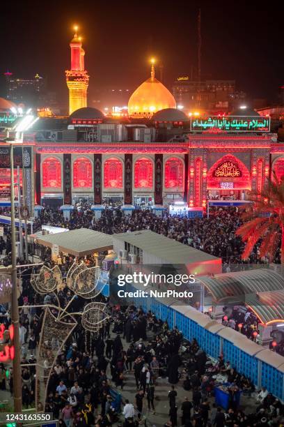 Shi'ite pilgrims gather in front of the holy shrine of Imam Hussein during the commemoration of Arbain in the holy city of Karbala, September 11,...