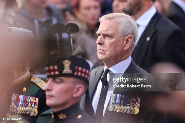 Prince Andrew, Duke of York walks behind Queen Elizabeth II's Coffin as it heads to St Giles Cathedral, after making its way along The Royal Mile on...