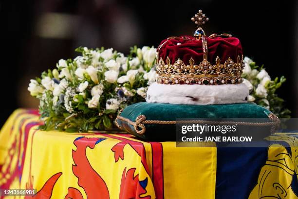 The Crown of Scotland sits atop the coffin of Queen Elizabeth II inside St Giles Cathedral in Edinburgh on September 12 during a service of...