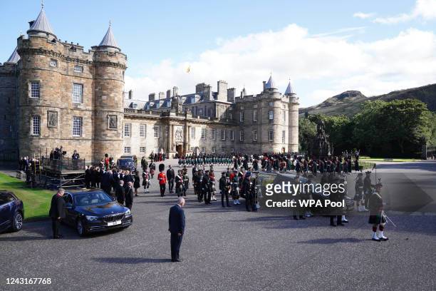 King Charles III and members of the royal family join the procession of Queen Elizabeth's coffin from the Palace of Holyroodhouse to St Giles'...