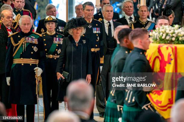 Britain's King Charles III, flanked by Britain's Princess Anne, Princess Royal, Britain's Camilla, Queen Consort, Vice Admiral Timothy Laurence,...
