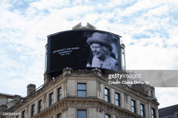 Billboard on Piccadilly with a tribute to Queen Elizabeth II on 12th September 2022 in London, United Kingdom. Queen Elizabeth II died at Balmoral...
