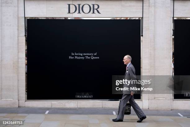 Blacked out shop window of Dior on Bond Street following the death of Queen Elizabeth II left as a mark of respect on 12th September 2022 in London,...