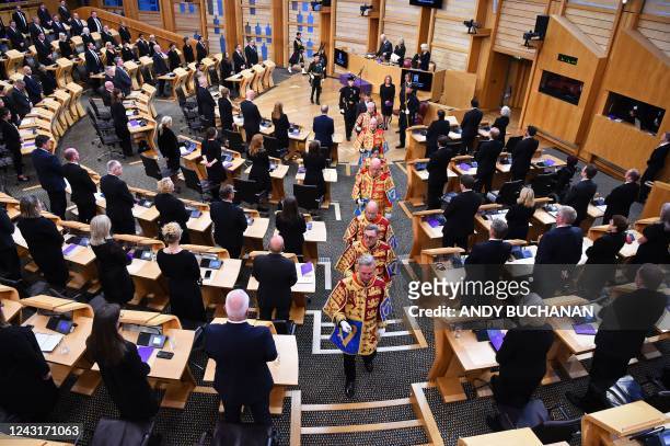 Heralds exit the Scottish Parliament where Scotland's First Minister Nicola Sturgeon tables a Motion of Condolence on behalf of the people of...