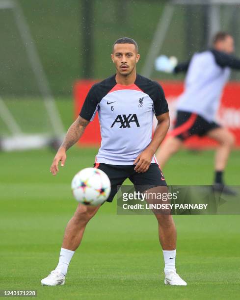 Liverpools Spanish midfielder Thiago Alcantara takes part in a training session at the AXA Training Centre in Kirkby, north of Liverpool in...