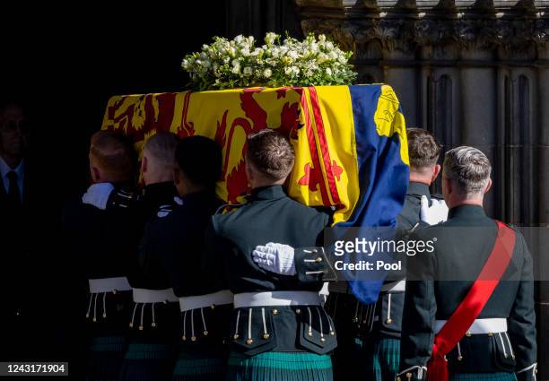 The Queen's coffin is carried in to St Giles Cathedral on September 12, 2022 in Edinburgh, Scotland. King Charles III joins the procession...