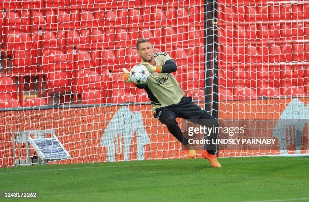 Ajaxs Dutch goalkeeper Maarten Stekelenburg takes part in a training session at the Anfield Stadium in Liverpool, north-west England, on September 12...