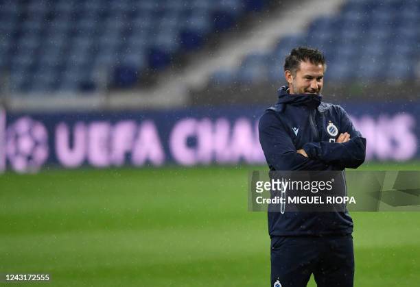 Club Brugge's Belgian head coach Carl Hoefkens takes part in a training session at the Dragao Stadium, in Porto, on September 12 on the eve of the...