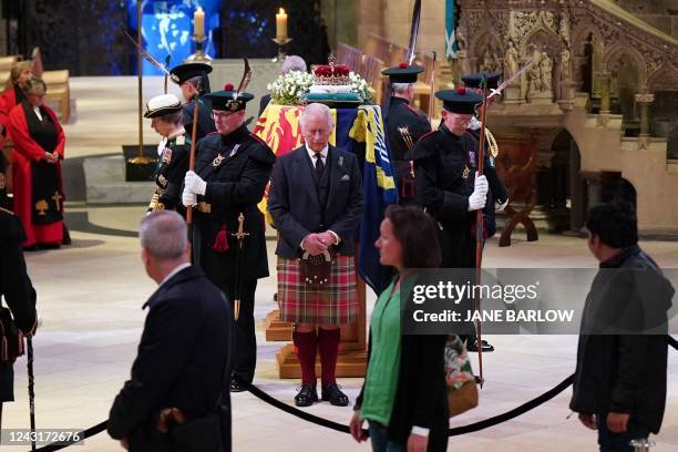 Members of the public file past as Britain's King Charles III, Britain's Princess Anne, Princess Royal, Britain's Prince Edward, Earl of Wessex, and...