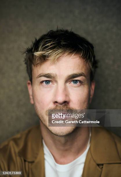 Albrecht Schuch of "All Quiet on the Western Front" poses in the Getty Images Portrait Studio Presented by IMDb and IMDbPro at Bisha Hotel &...