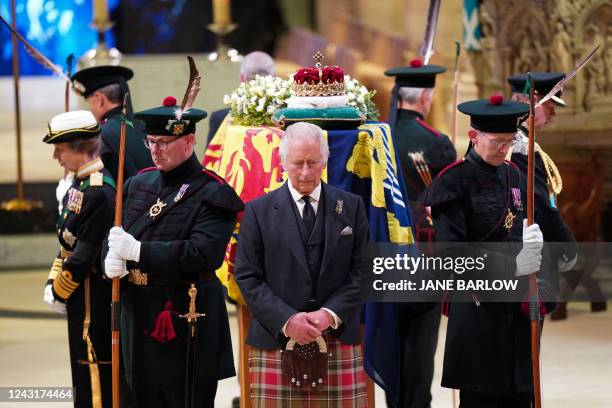 Britain's King Charles III attends a Vigil at St Giles' Cathedral, in Edinburgh, on September 12 following the death of Queen Elizabeth II on...