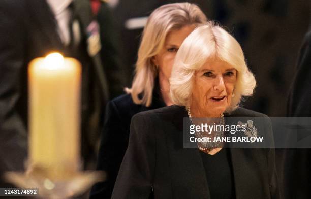 Britain's Camilla, Queen Consort arrives to attend a Vigil at St Giles' Cathedral, in Edinburgh, on September 12 following the death of Queen...