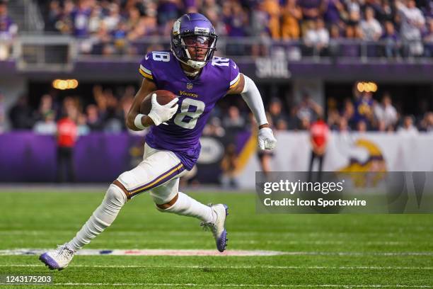 Minnesota Vikings wide receiver Justin Jefferson runs to the end zone for a 36-yard touchdown reception during the second quarter of an NFL game...