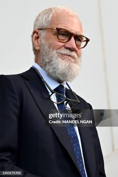 Television host David Letterman arrives for US President Joe Biden's remarks at the John F. Kennedy Library and Museum in Boston, Massachussetts, on...