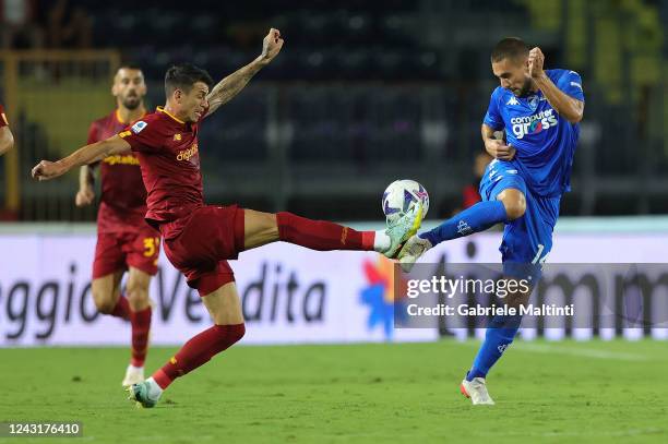 Roger Ibañez da Silva of AS Roma in action against Marko Pjaca of Empoli FC during the Serie A match between Empoli FC and AS Roma at Stadio Carlo...