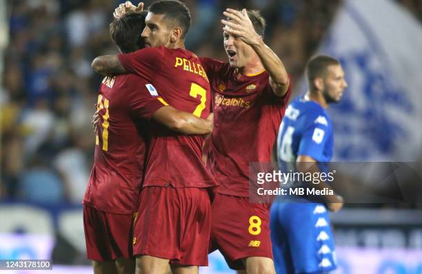 Paulo Dybala of AS Roma celebrates with team mates Lorenzo Pellegrini and Nemanja Matic after scoring his opening goal ,during the Serie A match...