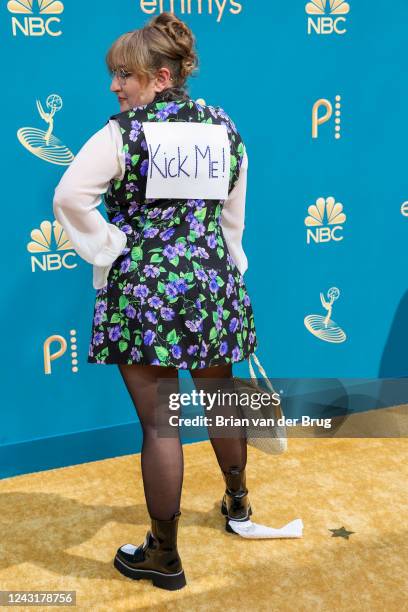 September 12, 2022 - Emily Heller wears a "Kick Me" sign on her back arriving at the 74th Primetime Emmy Awards at the Microsoft Theater on Monday,...