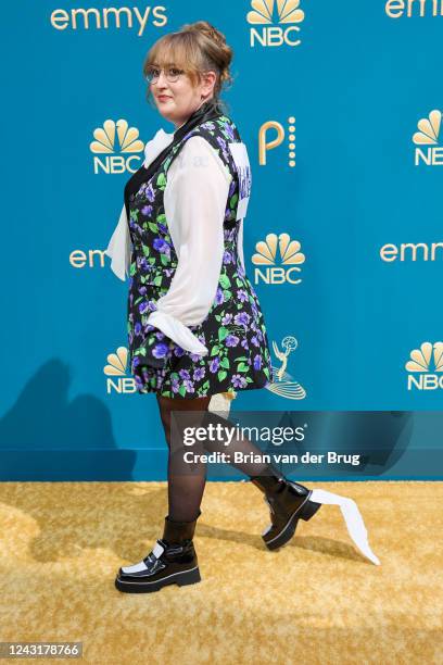 September 12, 2022 - Emily Heller wears a "Kick Me" sign on her back arriving at the 74th Primetime Emmy Awards at the Microsoft Theater on Monday,...