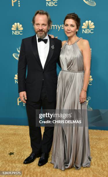 Peter Sarsgaard and Maggie Gyllenhaal arrive for the 74th Emmy Awards at the Microsoft Theater in Los Angeles, California, on September 12, 2022.