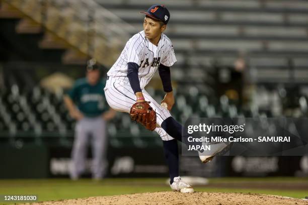 Yusefu Yoshimura of Japan pitches against Australia in the third inning during the WBSC Baseball World Cup Opening Round Group B game between...