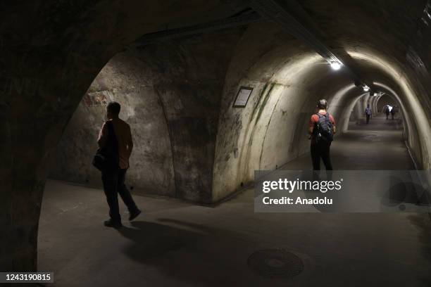 People are seen in Gric Tunnel during daily life in Zagreb, Croatia on September 09, 2022.