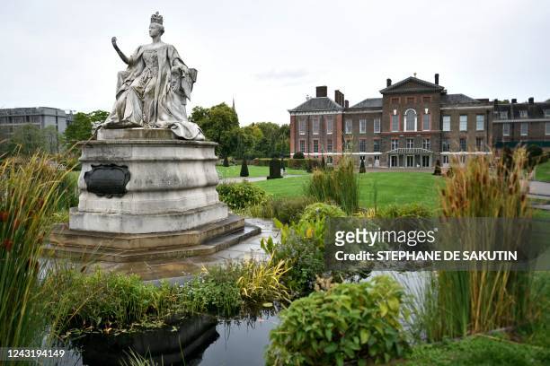 The Statue of Queen Victoria is pictured in the gardens of Kensington Palace in London on September 13 her birth place and home, it is the home of...