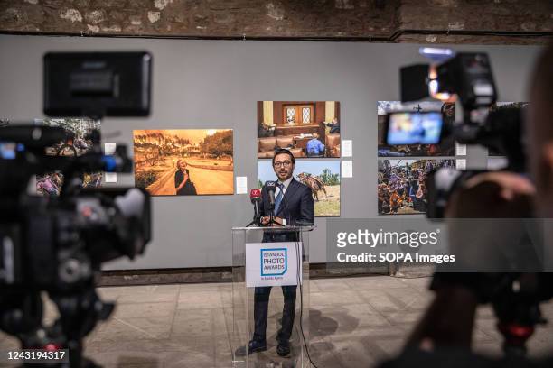Anadolu Agency General Manager Serdar Karagoz gives an opening speech during the Istanbul Photo Awards 2022 exhibition. Istanbul Photo Awards 2022...