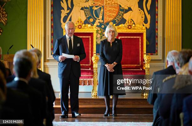 King Charles III, with the Queen Consort, speaks after receiving a Message of Condolence from Alex Maskey, the Speaker of the Northern Ireland...