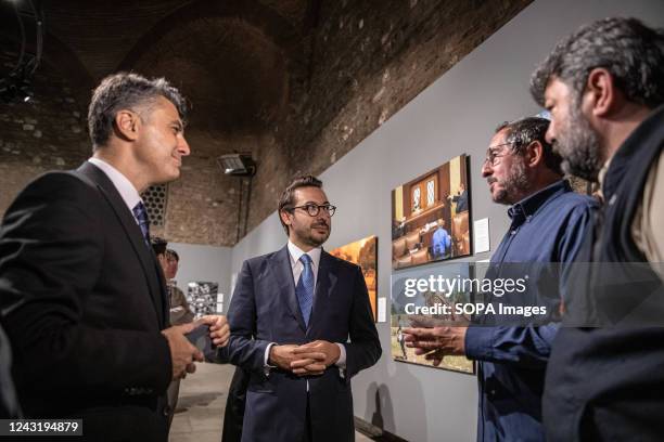 Anadolu Agency General Manager Serdar Karagoz and Anadolu Agency Visual News Editor Firat Yurdakul are seen talking to the guests about the...