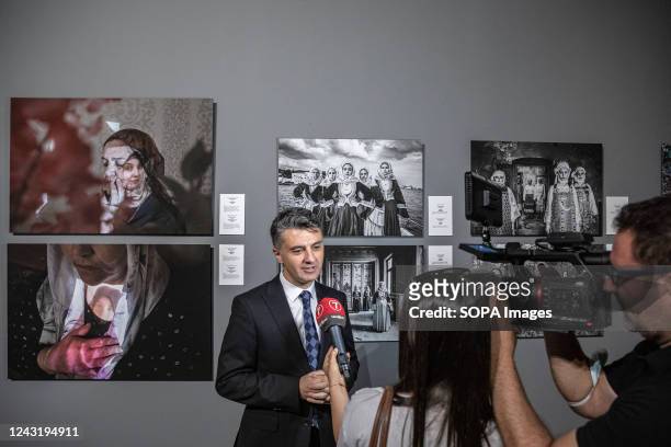 Anadolu Agency Visual News Editor Firat Yurdakul evaluates the exhibition during an interview with the press. Istanbul Photo Awards 2022 Exhibition...