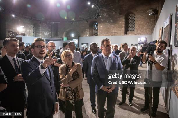 Anadolu Agency General Manager Serdar Karagoz is giving information about the photographs on display. Istanbul Photo Awards 2022 Exhibition At Mimar...