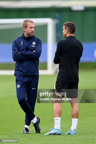 Head Coach Graham Potter and César Azpilicueta of Chelsea during a training session ahead of their UEFA Champions League group E match against FC...