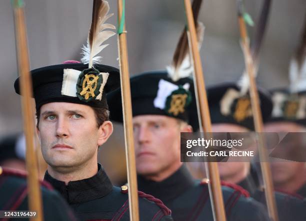 Members of the Royal Company of Archers march at St Giles' Cathedral in Edinburgh on September 13 where Britain's Queen Elizabeth II is lying at...