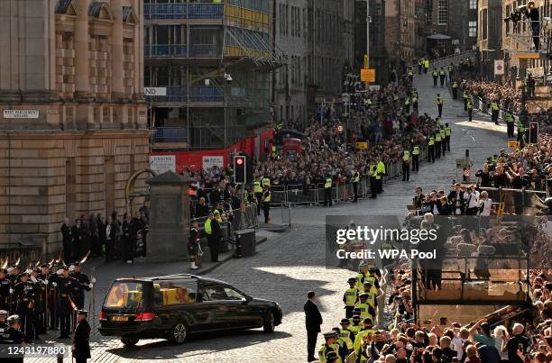 The hearse carrying the coffin of Queen Elizabeth II leaves St Giles' Cathedral on September 13, 2022 in Edinburgh, Scotland. The coffin carrying Her...