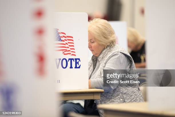 Voter fills out their ballot at Bedford High School during the New Hampshire Primary on September 13, 2022 in Bedford, New Hampshire. In one race,...