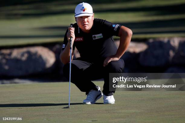 Sungjae Im lines up a putt on the 16th green during the final round of the Shriners Hospitals for Children Open golf tournament at TPC Summerlin,...