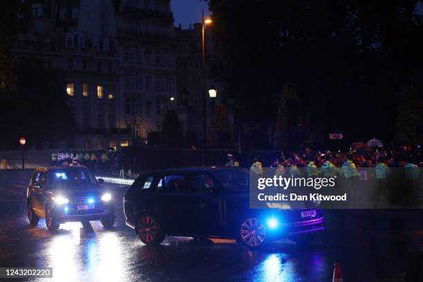 Car carrying Catherine, Princess of Wales and Prince William, Prince of Wales drives towards Buckingham Palace on September 13, 2022 in London,...