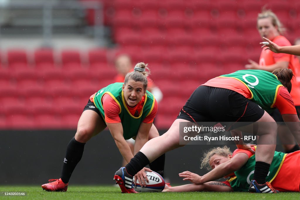 Claudia MacDonald of England prepares to pass the ball out of the ...