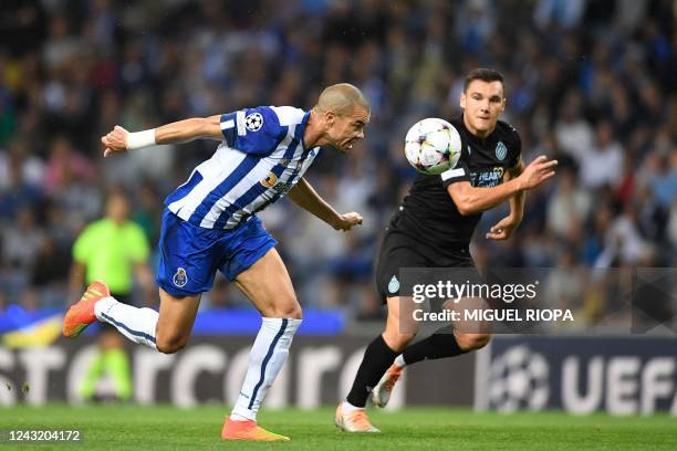 Porto's Portuguese defender Pepe heads the ball during the Champions League, group B, first leg football match between FC Porto and Club Brugge at...